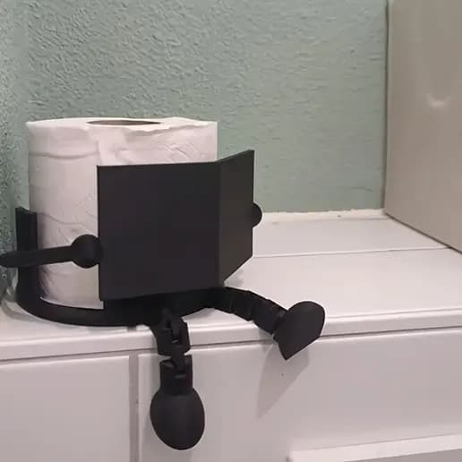 Suporte para Papel Higiênico Articulado com Pernas – Criativo, Divertido e Funcional
