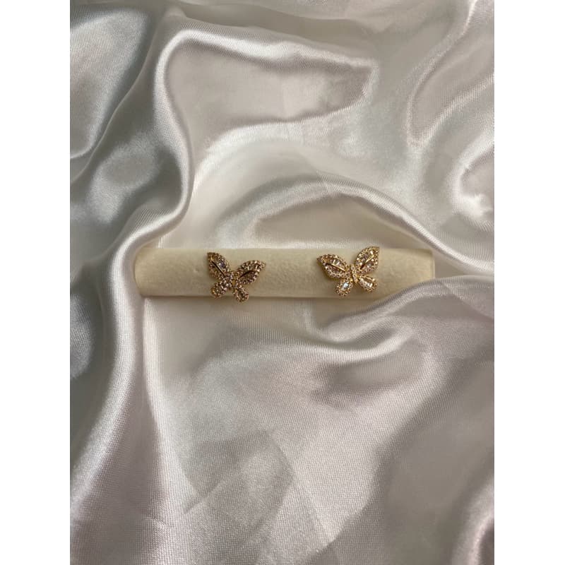-brinco de flor dourado