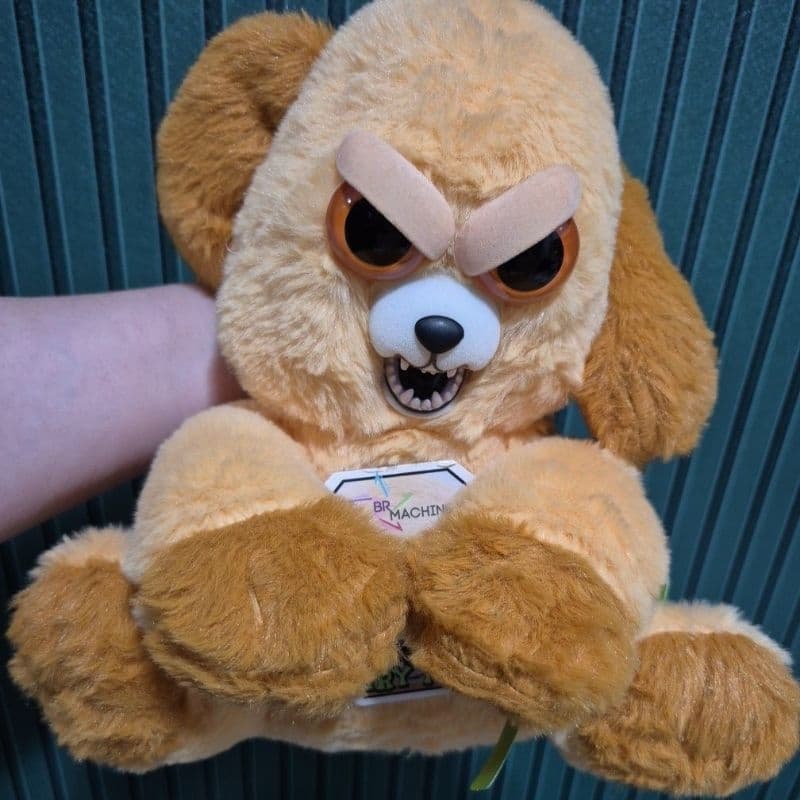 Cachorro de pelúcia Muda a expressão Feisty br machine sentado 25 cm de altura