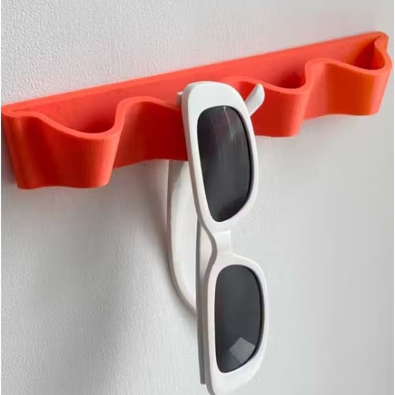Organizador de Óculos de Sol Wave: Estilo e Praticidade na Sua Parede