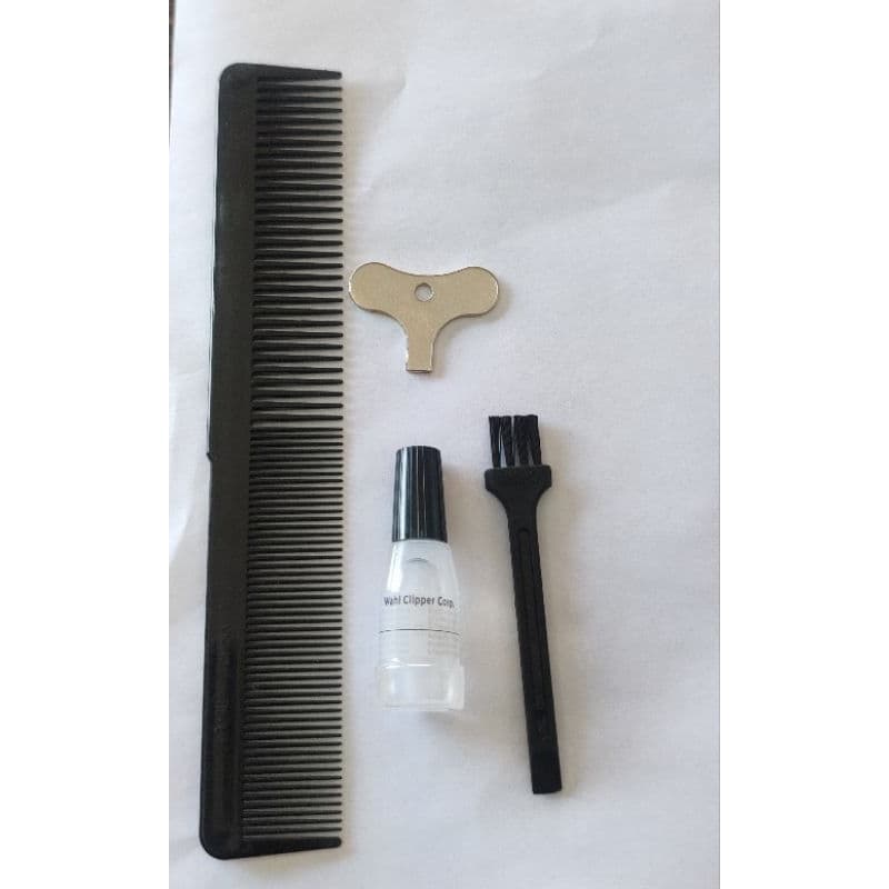 Kit com pente ,óleo , pincel,chave ajustador para máquinas de corte de cabelo