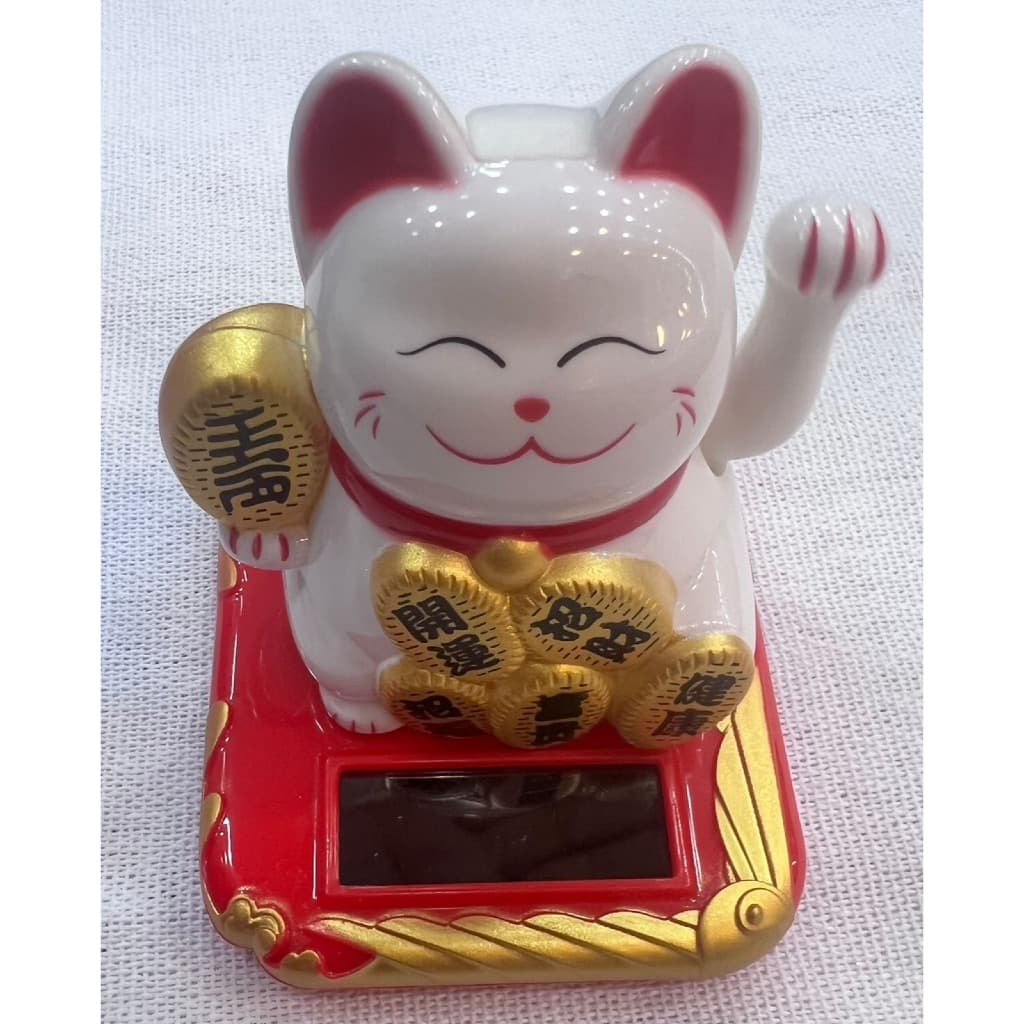 Gato da sorte solar