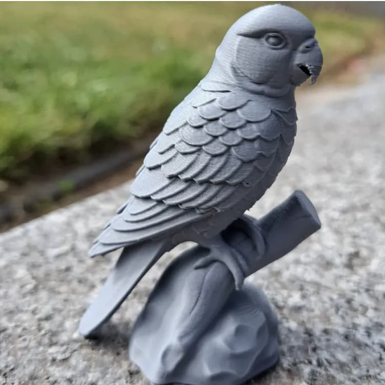 Escultura Decorativa de Papagaio  Apoiado em Galho - Decoração Casa Escultura Aves 3D