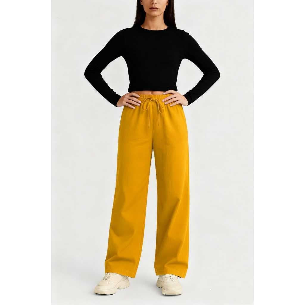 Calça Feminina Ampla com Cós Elástico – Modelagem Confortável, Estilo Casual e Leve para Verão 🌞