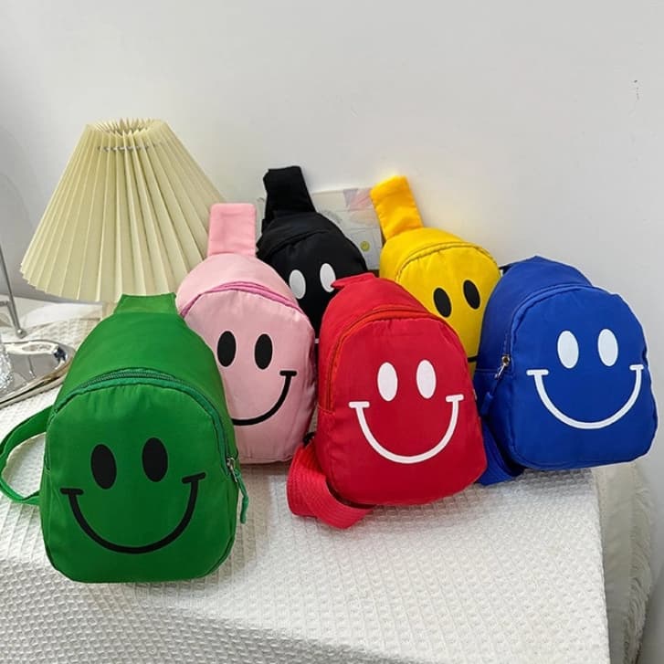 Mini Bolsa Infantil Estampa Sorridente Alça Transversal Regulável 6 Cores