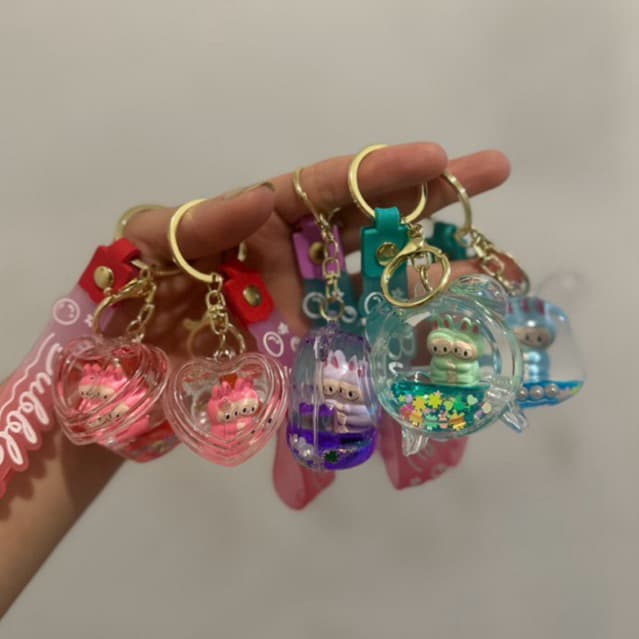 Chaveiro Fofo com Personagem e Glitter – Modelos Coloridos com Coração e Bolha Labubu