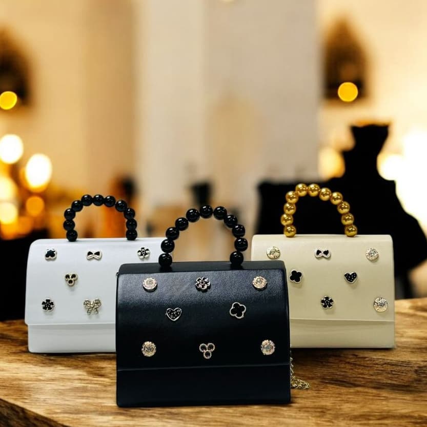 BOLSA INFANTIL BLOGUEIRINHA TRANVESSAL E ALÇA DE MÃO