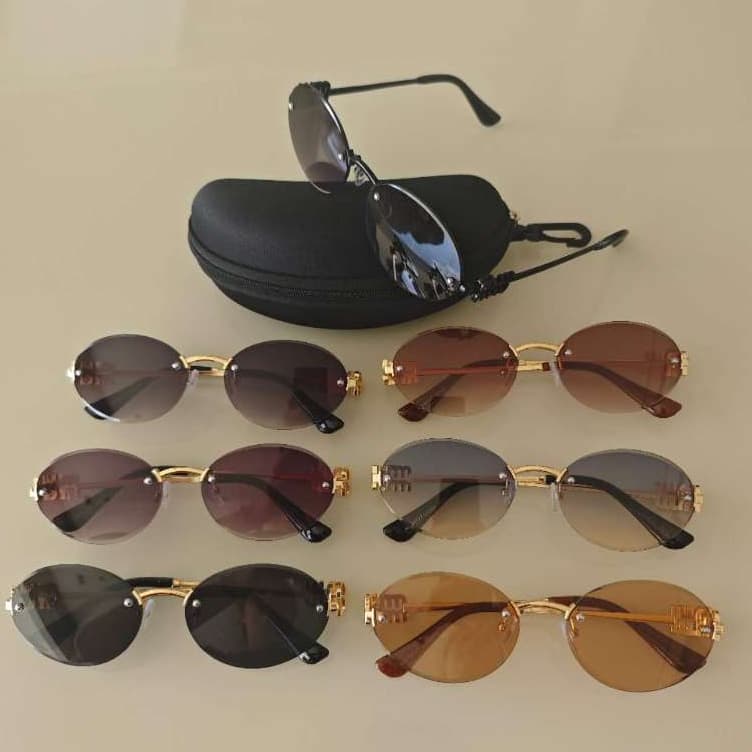 Óculos de Sol Feminino Oval UV400 – Armação Dourada com Detalhe de Luxo e Lente Degradê Sem Armação