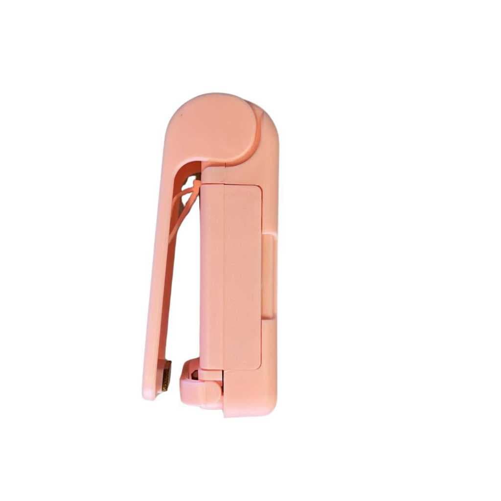 Mini Seladora De Embalagem Plástico Lacra Portátil Manual Cor Rosa