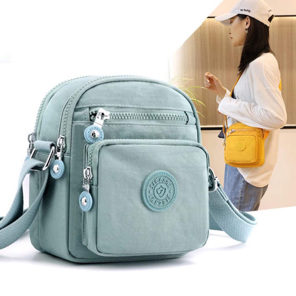 Bolsa feminina Pequena Nylon impermeável Bolsa de Lado Tiracolo Transversal Com Chaveiro