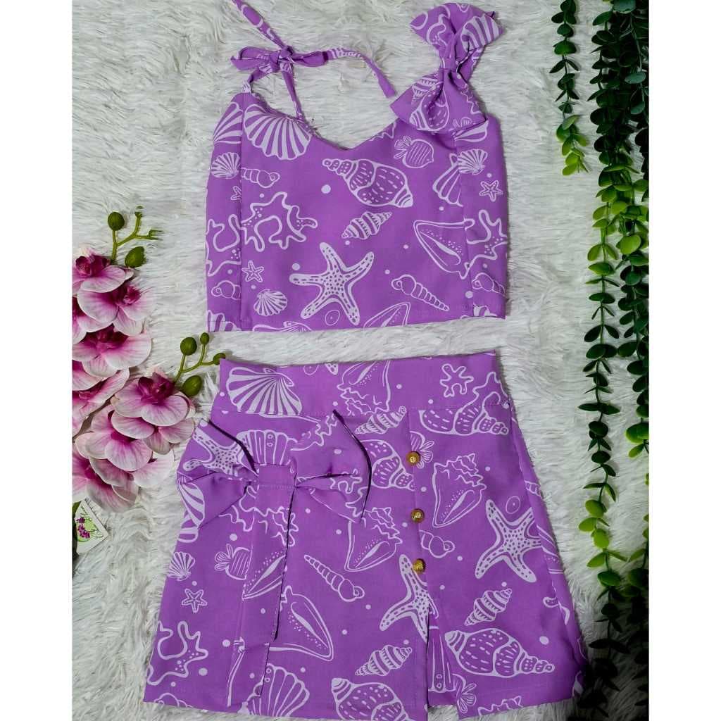 Conjunto infantil menina verão short saia e cropped com detalhes de laços