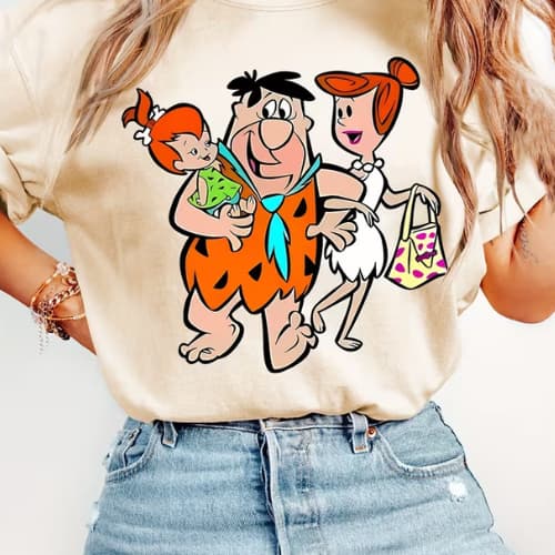 CAMISETA FEMININA ESTILOSA PRE HISTORICA EXCLUSIVA,CHARMOSA DESENHOS CLASSICOS,DIVERTIDA,FLINTSTONES  FREED FAMILIA