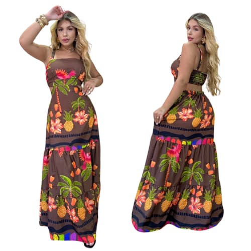 Vestido longo tropical com estampa vibrante, tecido leve e caimento perfeito. Ideal para verão, praia e looks casual