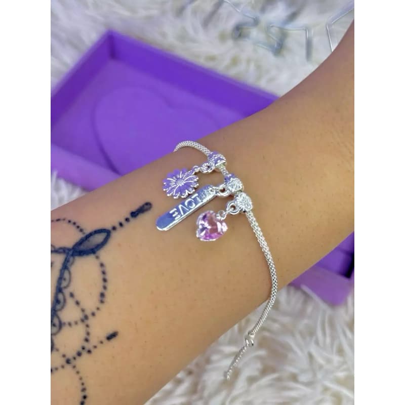 Pulseira patuá flor banhada à prata