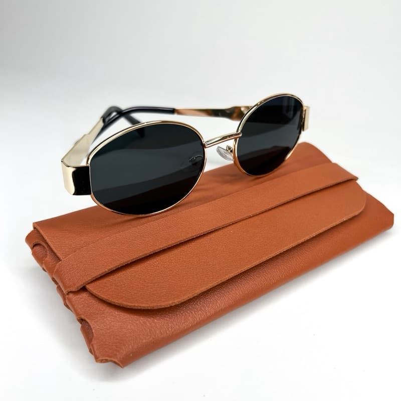 óculos de sol feminino UV 400 oval preto moldurado metal dourado vintage c/ case