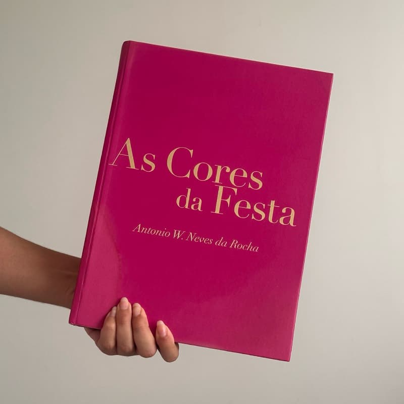 Livro ‘As cores da Festa - Antônio W. Never da Rocha Capa Dura Sebo Usado Brechó Bazar