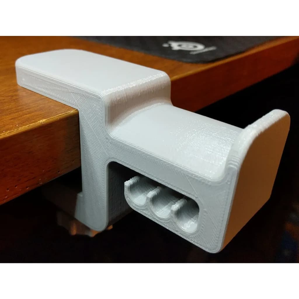 Suporte/fixador/braçadeira para fones de ouvido de mesa (COM SUPORTE P/ FIO)