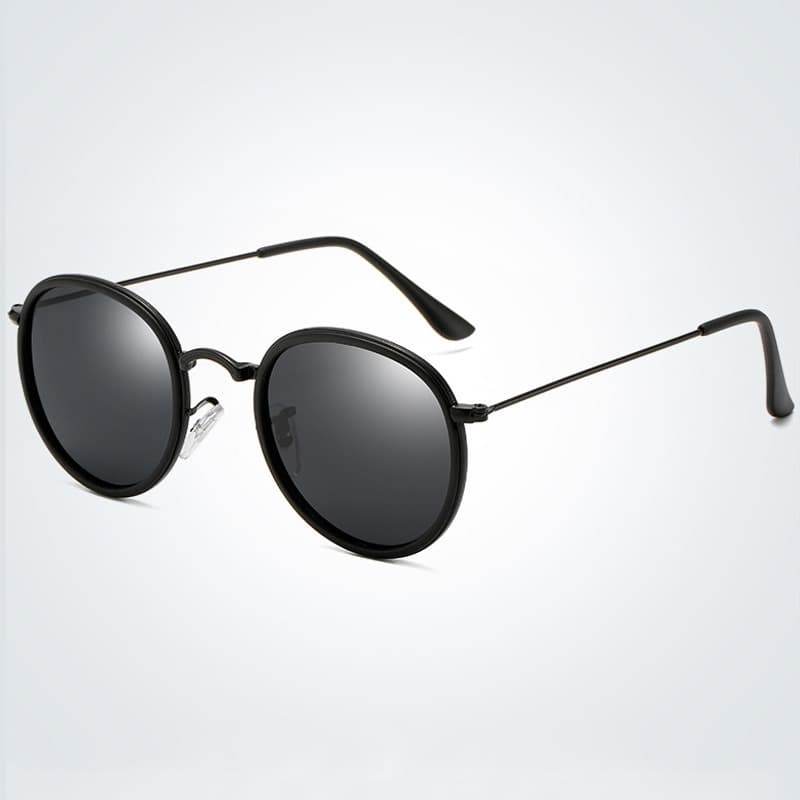 Óculos de sol unissex feminino masculino redondo preto round metal tendência 2026 moda estilo proteção UV