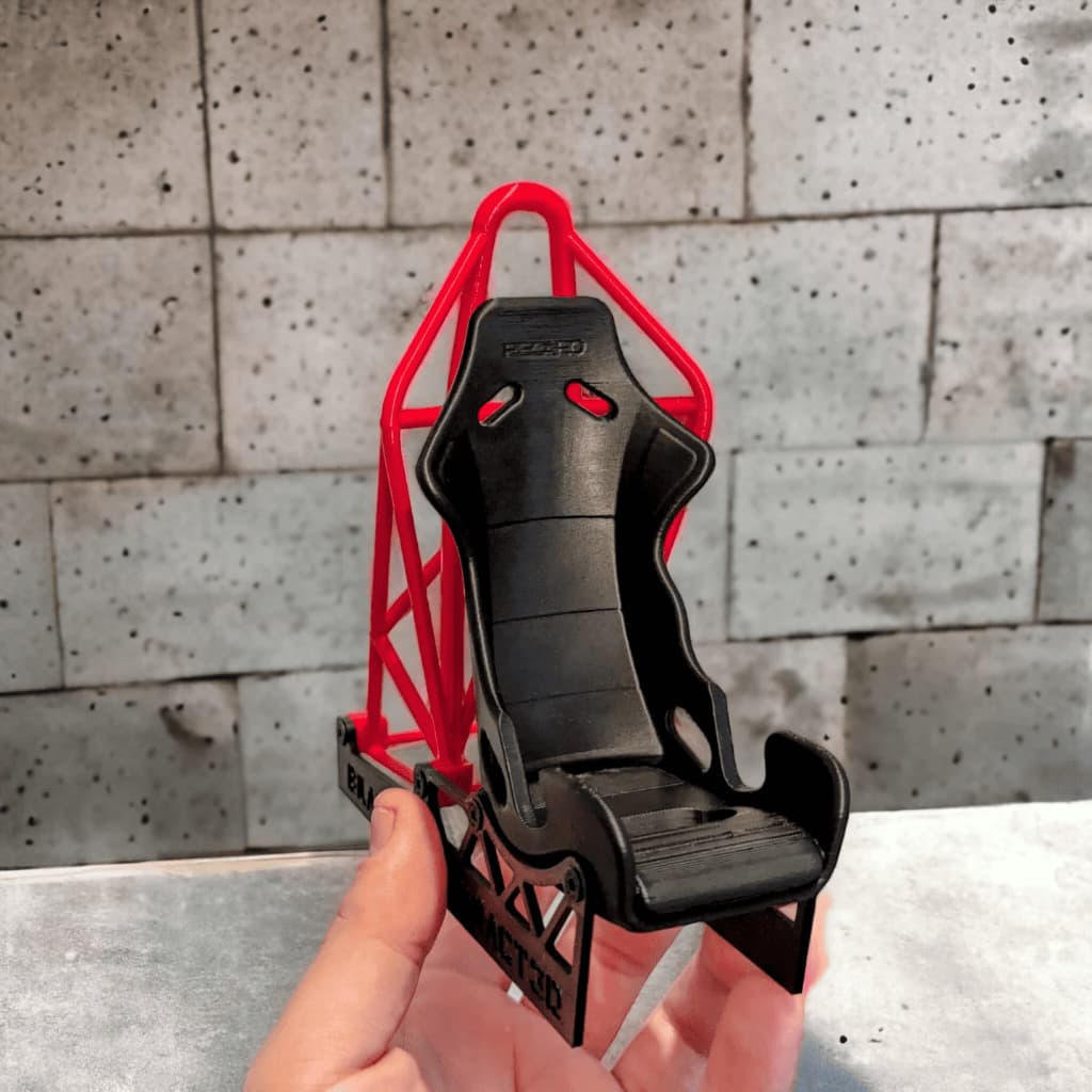 Suporte para Celular Estilo Banco de Carro de Corrida com Grade – Design Esportivo