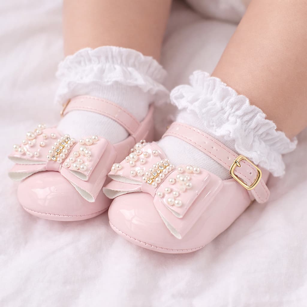 Sapatilha bebê rosa com laço em pérolas super luxuosa macia e confortável