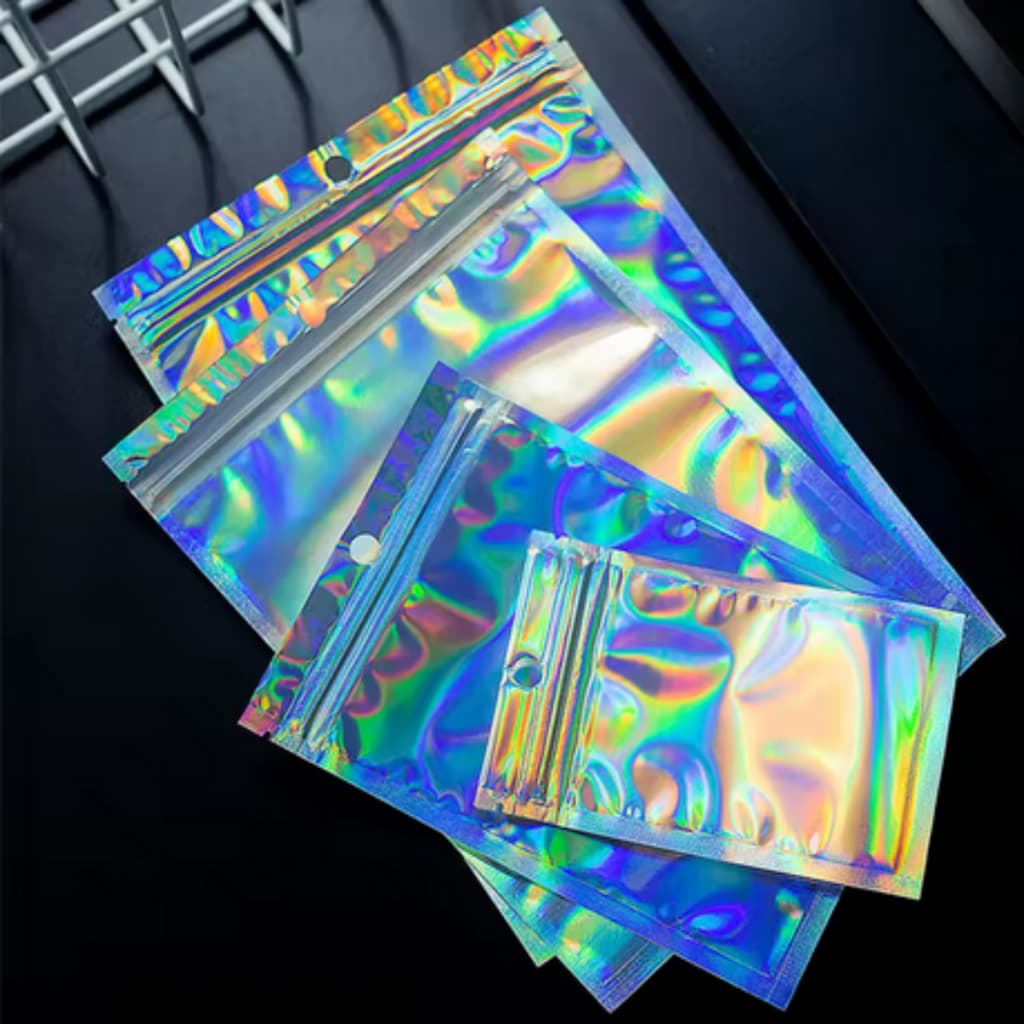 Kit 50 Saco holográfico auto-vedante com padrão de arco-íris a laser adequado jóias e bijuterias
