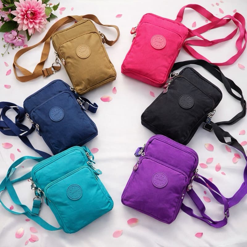 Bolsa Transversal Compacta Com Alça Lateral