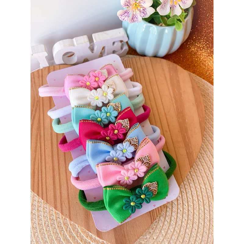 Kit com 7 faixinhas de bebê - tiaras para bebê - Kit de laços