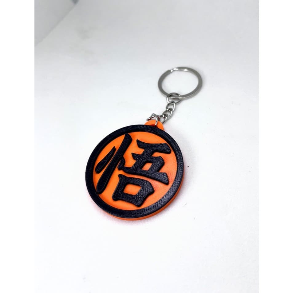 Kit 10 Chaveiro Revenda Símbolo Goku Dragon Ball Z Anime Geek Resistente
