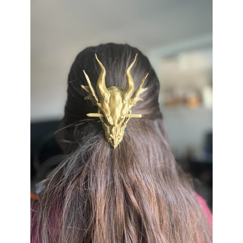 Presilha de cabelo em formato de crânio de dragão