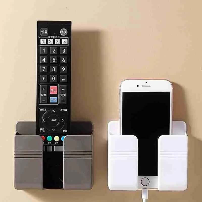 Suporte Multiuso De Parede Para Celular e Controle Remoto