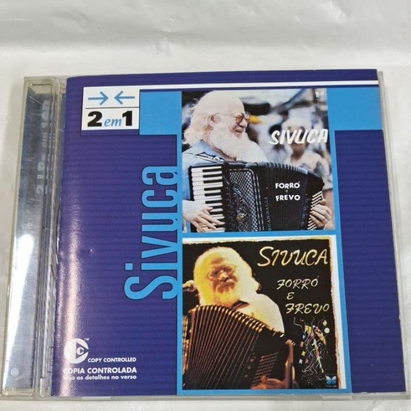 CD- SIVUCA 2EM1 FORRÓ E FREVO( USADO) LEIA A DESCRIÇÃO