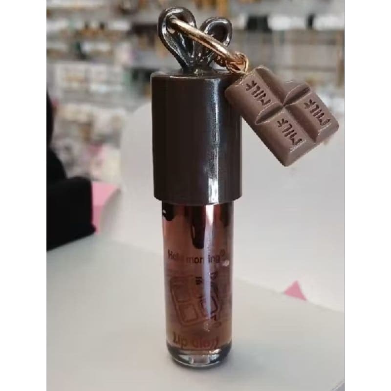 Gloss labial de chocolate com pingente