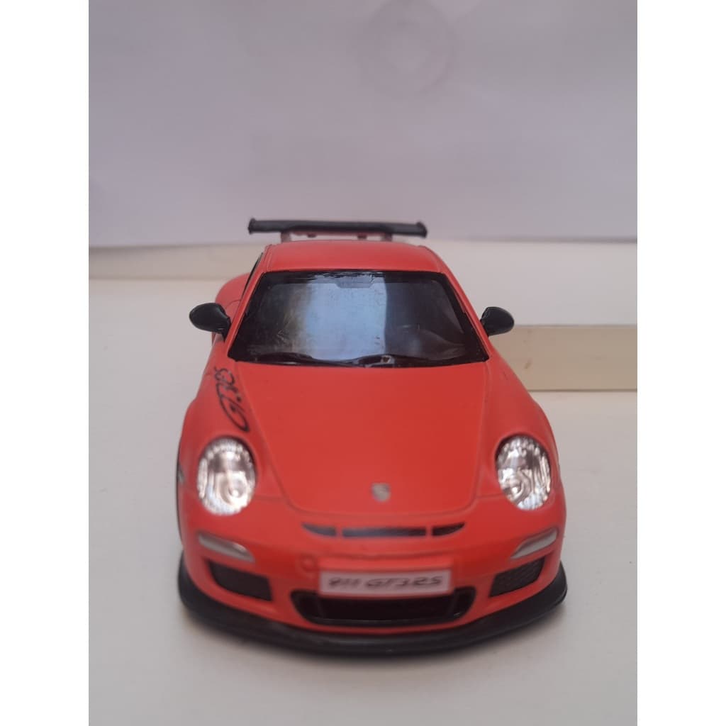 Miniatura Porsche 911 GT3 RS 2010 Laranja Fosco Kinsmart 1:36 Metal e Fricção