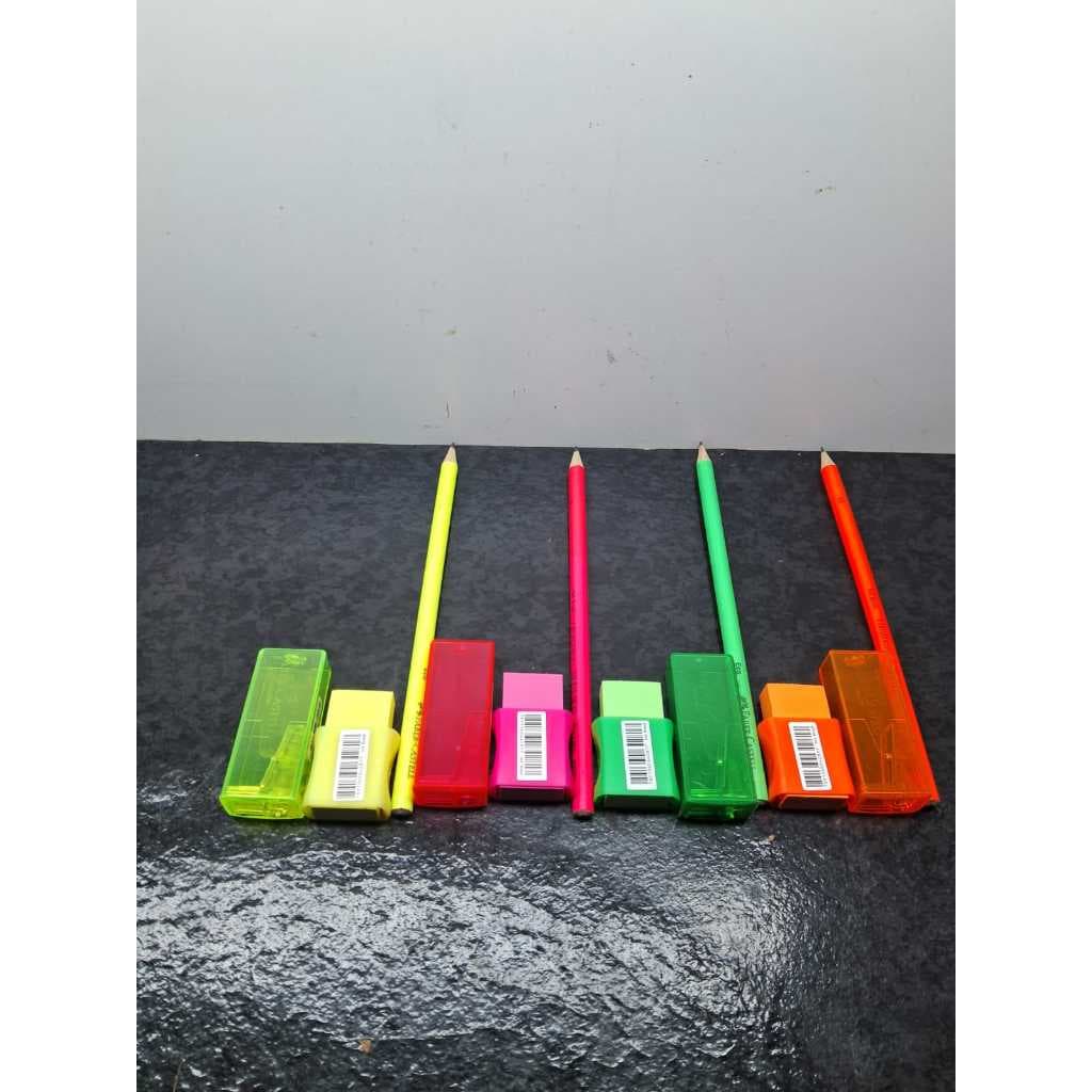 KIT FABER CASTEL COMPOSTO DE UM LAPIS PRETO NEON, 1 APONTADOR C/DEPOSITO NEON E 1 BORRACHA COM CNTA NEON