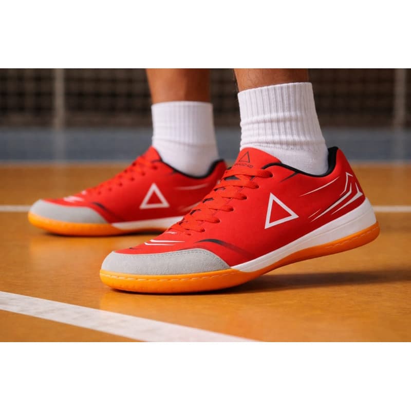 Tênis futsal chuteira original vermelha para todas as ocasiões com solado antiderrapante e ótimo acabamento .