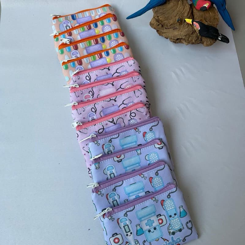 50 Farmacinhas/Bolsinhas sortidas 14x11cm usada como porta remédios e comprimidos e absorventes.