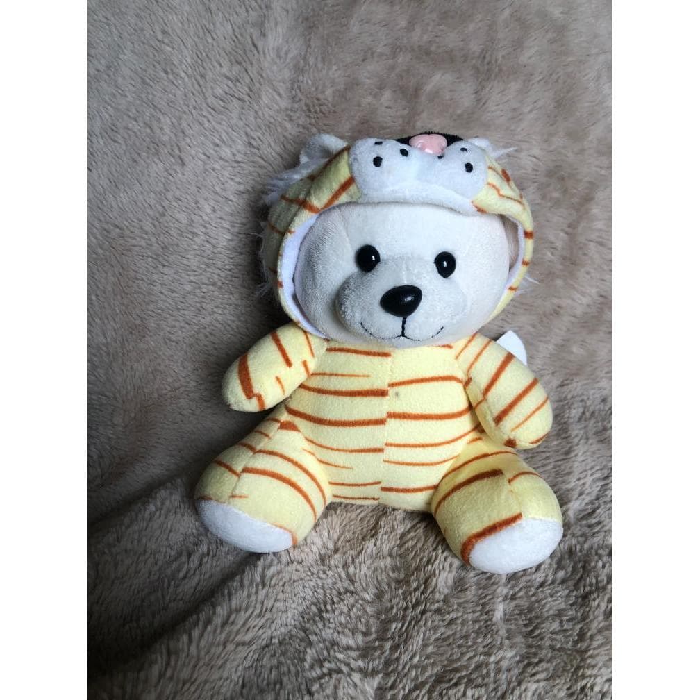 Urso branco de capuz em pelúcia BR Machine