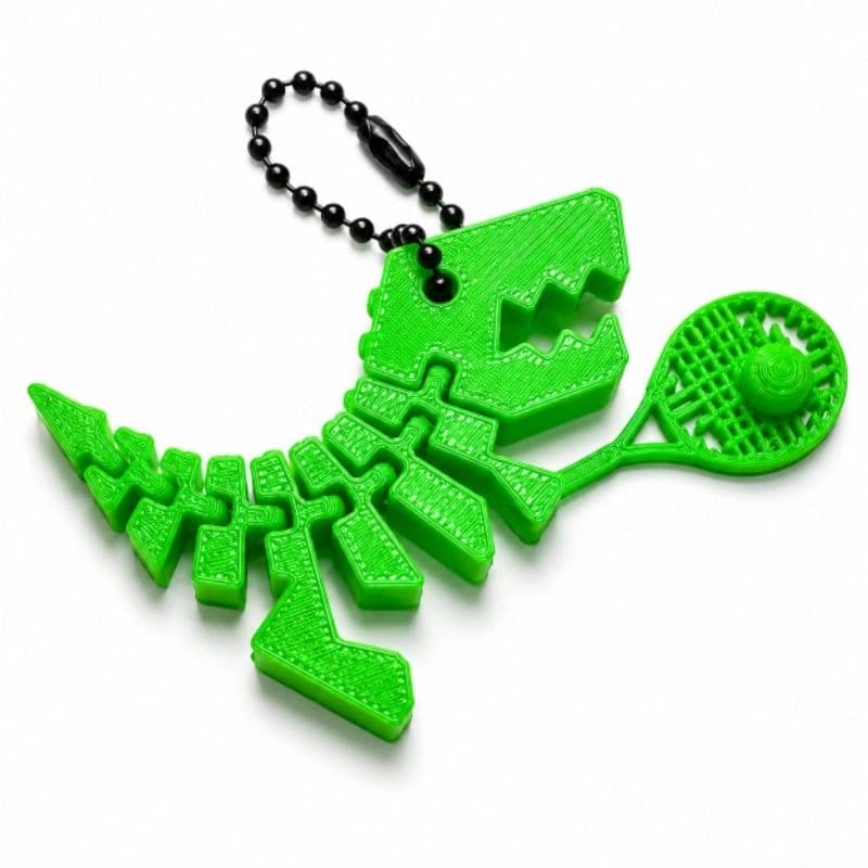 Chaveiro Tênis 3D com Bolinha Na Raquete - Dinossauro T-Rex