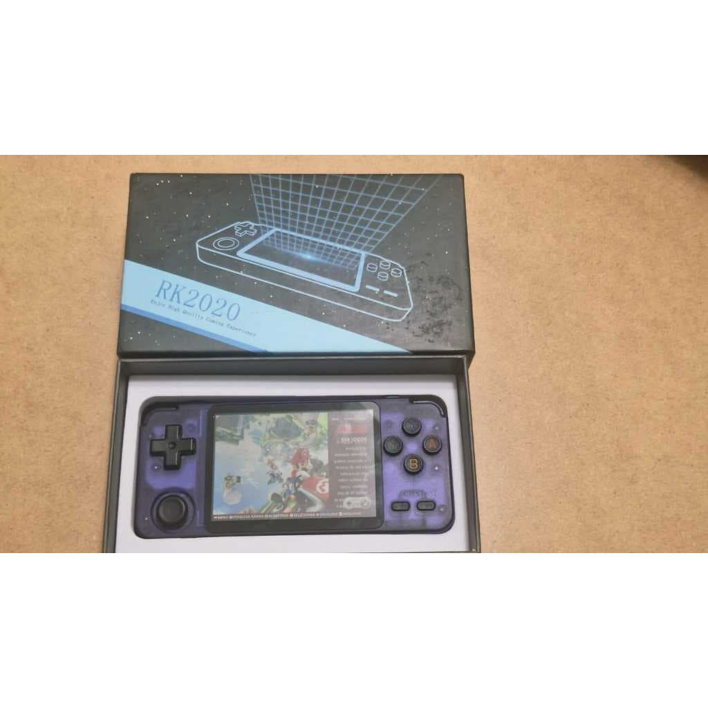 Vídeo Game Portátil RK2020 / R36H Roxo Transparente - 64GB com Jogos Clássicos