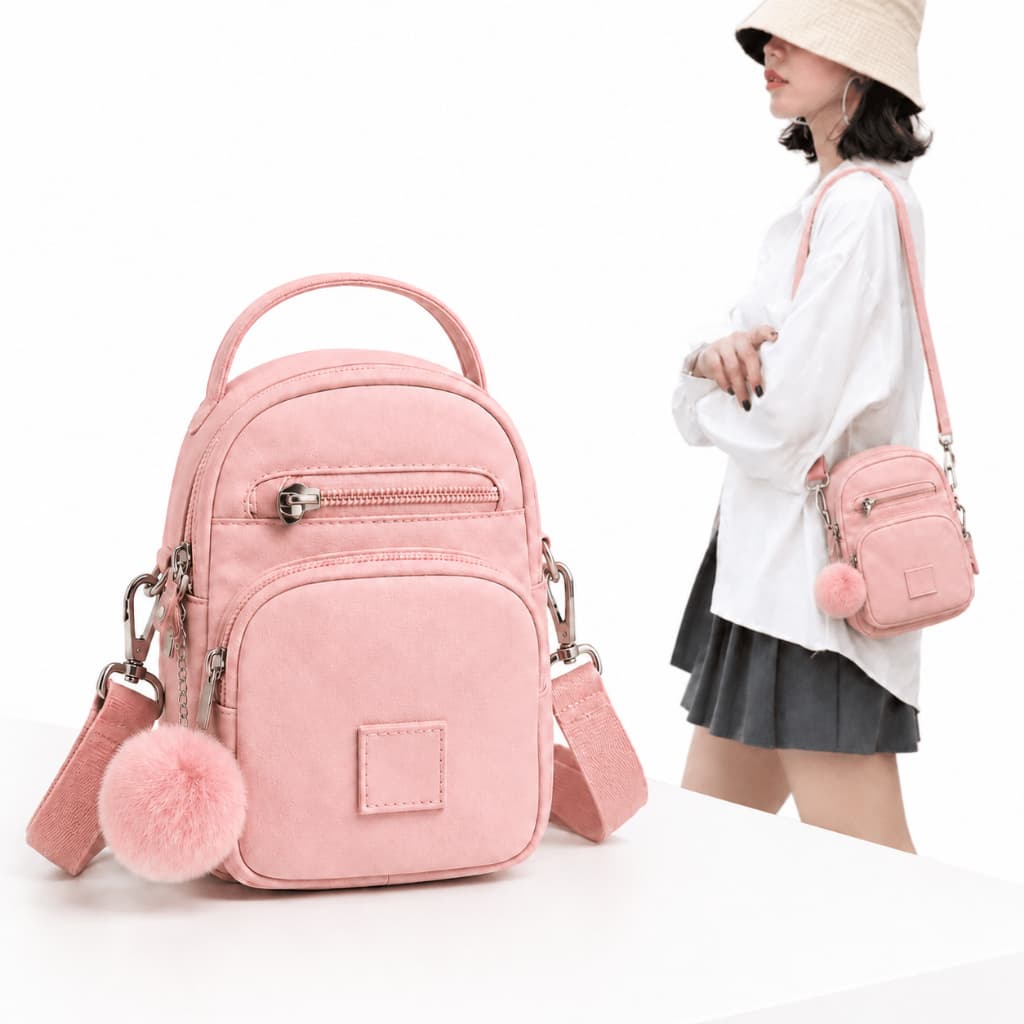 Bolsa Feminina Nylon Premium Impermeável Com Pompom Casual Vira Mochila Transversal Tiracolo Leve Alça