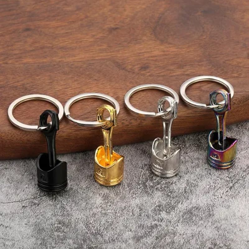 Chaveiro Formato Pistão de Motor – Design Realista e Resistente