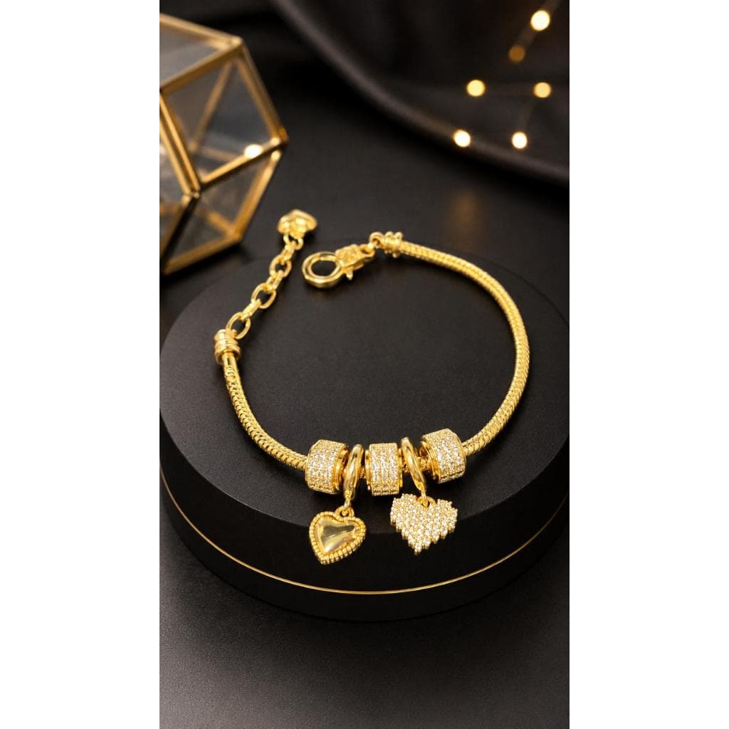 Pulseira e berloque de coração cravejado zircônio folhedo a Ouro 18 k