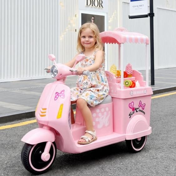 Moto Elétrica Infantil 12V Sorveteria motinha com porta malas luzes acelerador - Rosa