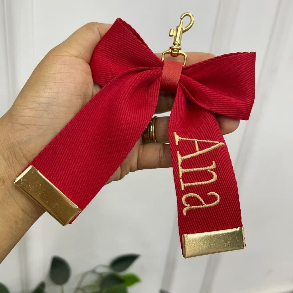 Laço personalizado com nome+acessorio+pingente.