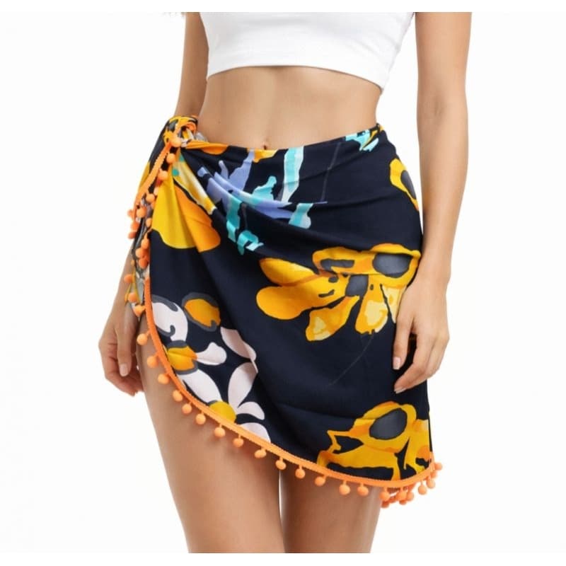 canga saída de praia com pompom saia en viscolinho estampado con pompom