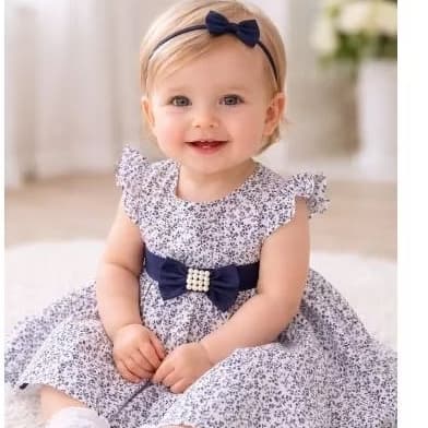 VESTIDO CREPE ESTAMPADO DE FLORES AZUIS COM LAÇO MARINHO NAS COSTAS VESTIDO RODADO E FORRADO