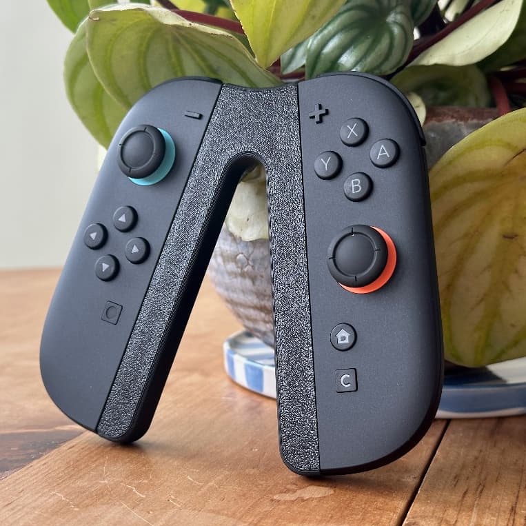 Suporte Controle Switch 2 Compacto Ergonômico Gamer Grip Joy-Con