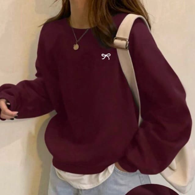 Moletom casual de cor sólida, gola redonda com estampa de laço.