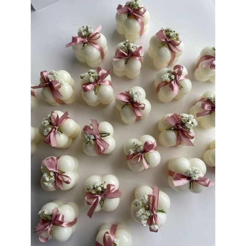 Bubble com flor e tag personalizado.