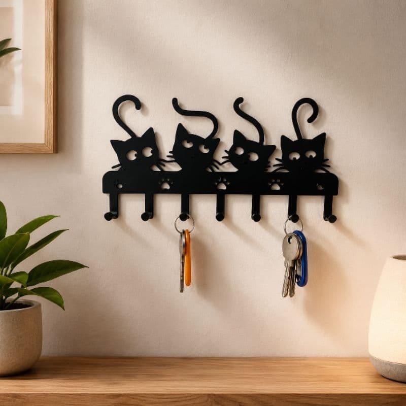 Suporte de chaves de parede com formato de gato.